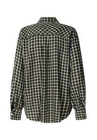 Chemise à manches longues à carreaux noirs et blancs avec poignets boutonnés, vue de dos sur fond blanc.