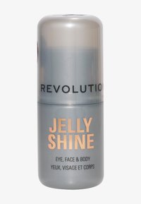 Grå sylinderformet beholder med blank overflate, merket "Jelly Shine" i fet gullskrift; designet for bruk på øyne, ansikt og kropp.