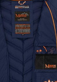 Navy blue puffer jacket interior featuring diamond quilt pattern, orange accents, a logo label, and multiple compartment pockets for storage.