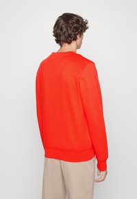 Tommy Hilfiger LOGO - Camisola - acid orange