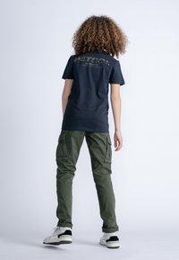 Petrol Industries B-3030-TRO581 - Kapsáče - green
