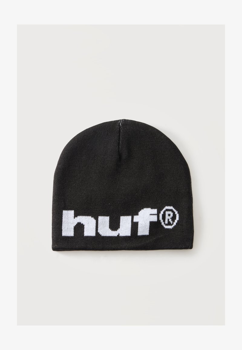 Bonnet en tricot noir avec un logo blanc audacieux "huf" et le symbole de marque déposée à l'avant, présenté sur un fond clair uni.