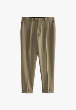 Helepruunid püksid siledast kangast, sirge lõikega, pressitud voltide ja üles keeratud äärtega, mis tagavad puhta viimistluse.