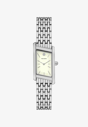 Sølv rustfrit stål ur med rektangulært urglas, lys gul skive og hævede timemarkeringsindikatorer. Link-stil mesh-rem, simpel krone.