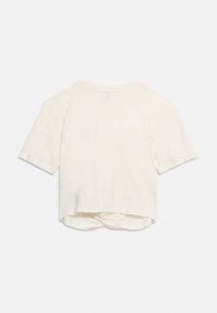Εκρού cropped κοντομάνικη μπλούζα με στρογγυλή λαιμόκοψη και συστραμμένη λεπτομέρεια κόμβου στο πίσω μέρος του τελειώματος.