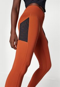 Peak Performance LIGHTWEIGHT - Leggings - spiced