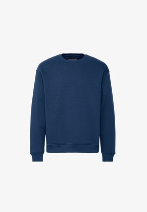 Tumedat sinise värvi puuvillasegusest kangast dressipluus, millel on ümmargune kaelus, soonikuga varrukas ja alumineäär, sile tekstuur ning lahtine lõige.