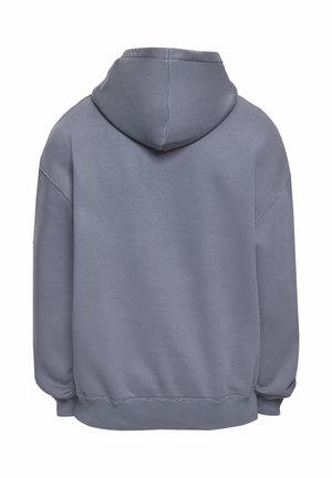 Gray oversized hoodie shown from the back, featuring a hood, long sleeves with ribbed cuffs, and a ribbed waistband.