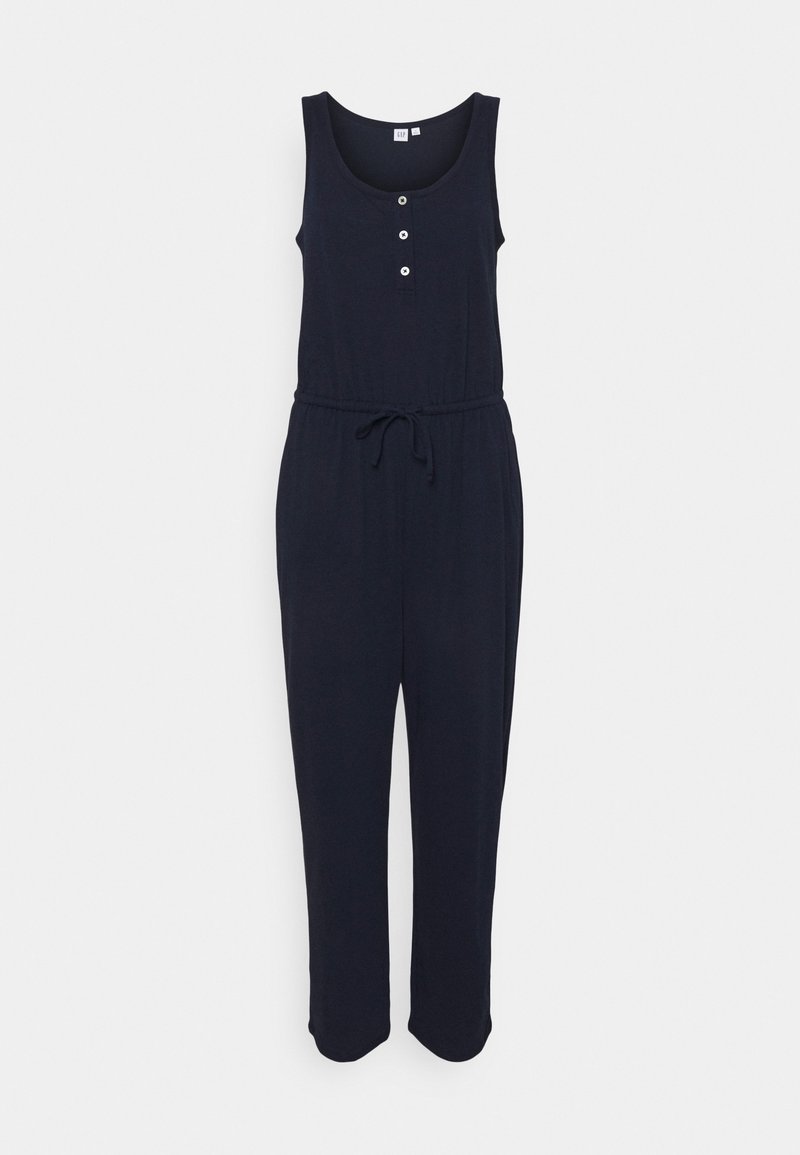 Mörkblå overall med ärmlös design, rundad halsringning, framknäppning med tre knappar, justerbart dragsnöre i midjan och avsmalnande ben.