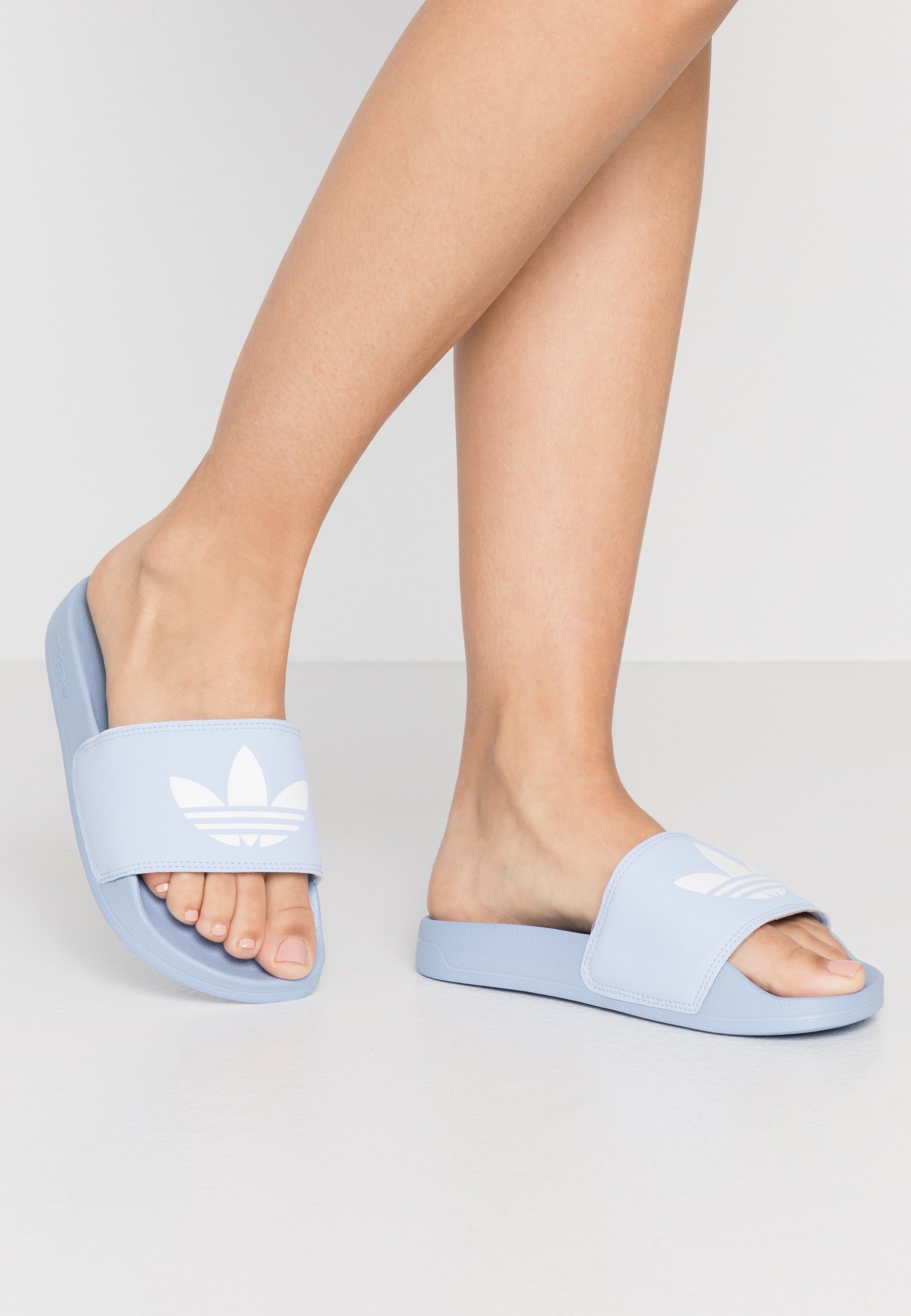 periwinkle adidas slides
