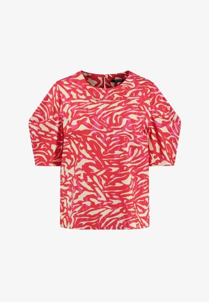 Top a maniche corte con un vivace motivo astratto in rosa acceso e crema, caratterizzato da una scollatura rotonda e una vestibilità comoda. Il tessuto ha una texture liscia.