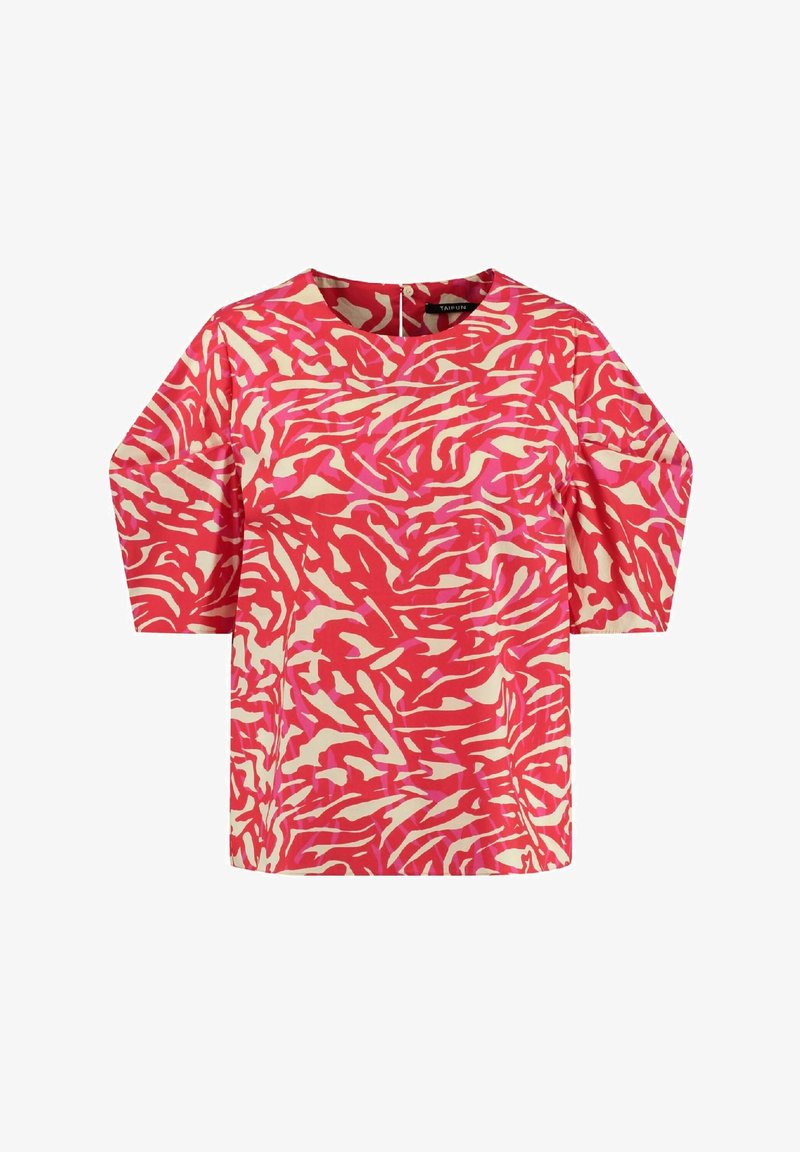 Haut à manches courtes avec un motif abstrait vibrant en rose et crème, présentant un col rond et une coupe décontractée. Le tissu a une texture lisse.