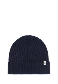 Dark navy blue ribbed knit beanie with folded cuff and small white rectangular label on the cuff.