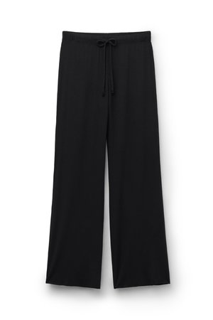 Pantalons larges noirs avec taille élastique et cordon de serrage sur le devant, affichés à plat sur fond blanc.