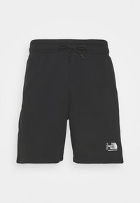 Shorts décontractés noirs avec taille élastique et cordon de serrage, avec un logo blanc The North Face sur la partie inférieure de la jambe gauche.