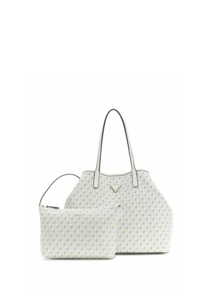 Sac à main blanc à motifs avec deux fines poignées à côté d'une petite pochette assortie zippée, tous deux présentant des motifs géométriques subtils.
