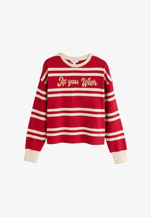 Roter Pullover mit langen Ärmeln, cremefarbenen horizontalen Streifen und cremefarbenen Bündchen, mit dem Schriftzug "As you Wish" in goldener Schrift auf der Brust.