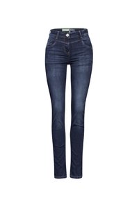 Dark blue denim skinny jeans with five pockets, a zip fly, and a button closure. The fabric has a smooth texture and slight stretch.