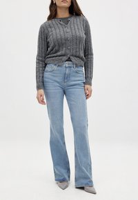 NA-KD Flared jeans - light blue