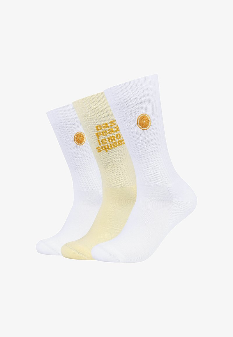Tre ribbede ankelsokker, to hvide med appelsinskive-logoer og en lys gul med teksten "easy peazy lemon squeezy" i orange.