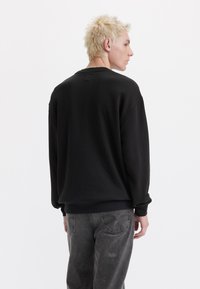 Levi's® RELAXED GRAPHIC CREWNECK SWEATSHIRT - Mikina - babytab camo floral crew caviar