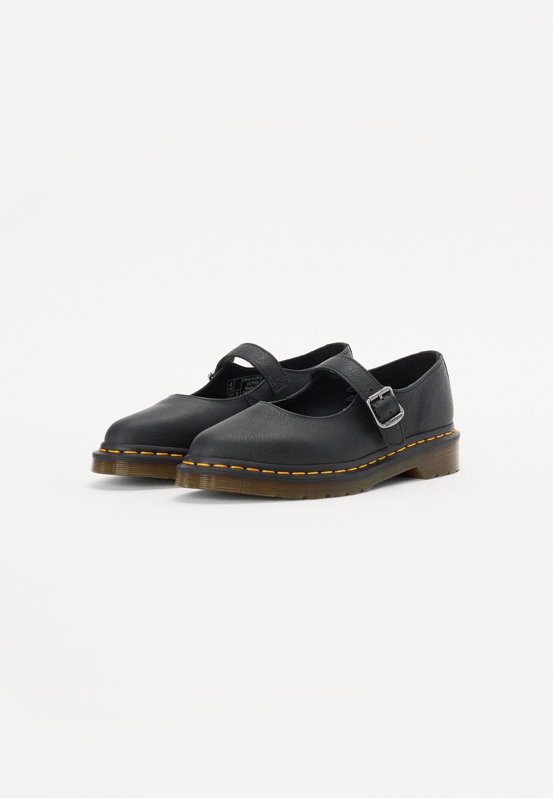 Black leather Mary Jane shoes with a buckle strap, rounded toe, and contrasting yellow stitching along the sole and around the upper edge.