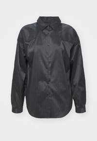 Black and gray striped shirt made of glossy material with a button-down front, collar, and long sleeves, featuring a relaxed fit and rounded hem.