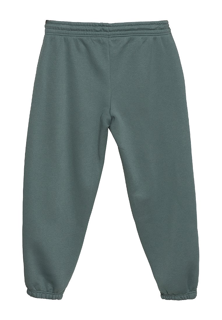 Sweatpants in einer gedämpften Tealfarbe, aus weichem Baumwollmischgewebe, mit einem elastischen Bund und gerippten Bündchen an den Knöcheln.
