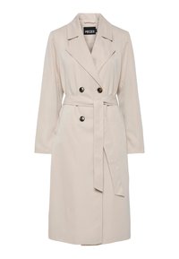 Trench-coat beige croisé avec larges revers, boutons noirs, manches longues et ceinture en tissu assorti à la taille.