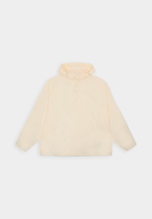 Kremowa bluza z kapturem i długimi rękawami, z trzema napami przy szyi, leżąca płasko na jasnym tle.