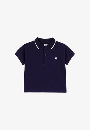 Polo blu navy a maniche corte, con rifinitura bianca sul colletto e piccolo logo sul petto. Realizzata in tessuto di cotone texturizzato. Spilla con due bottoni.