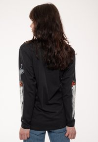 Paradiso Clothing CYPRESS HILL BLUNTED - Long sleeved top - black