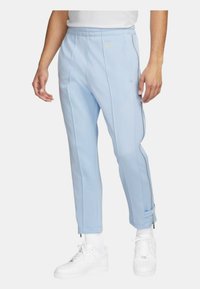 Nike Sportswear Tygbyxor - light blue