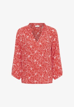 Červená blúzka s bielymi kvetinovými obrysmi, dlhými rukávmi, volánovým golierom a výstrihom do V.