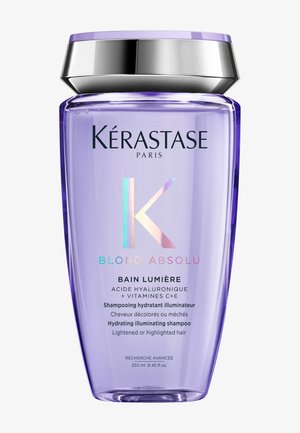 Lilla Kérastase Blond Absolu Bain Lumière sjampoflaske med sølvlokk for lysnet eller stripet hår, 250 ml.