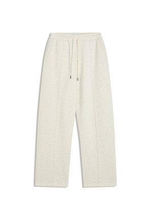 Light beige, wide-leg sweatpants made from soft fabric. Features an elastic waistband with drawstring and side pockets for utility.