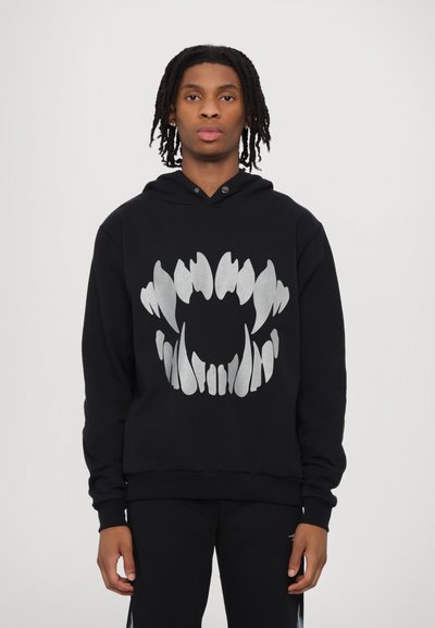 Black sweatshirt with a large silver claw graphic on the front. Features a hood and ribbed cuffs. Made from soft, textured fabric.