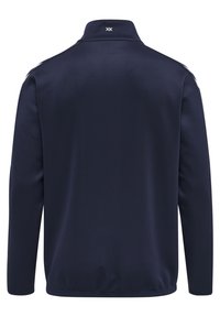 Navigatijacket in marineblauw met een hoge kraag, gemaakt van gladde stof. Heeft een subtiele logo op de achterkant en lange mouwen. Geen zichtbare details aan de voorkant.