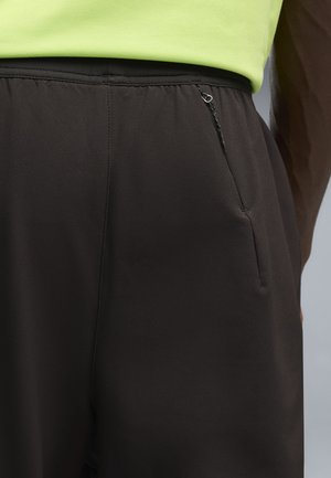 Puma, WINDCELL LAUFHOSE - Verryttelyhousut - black