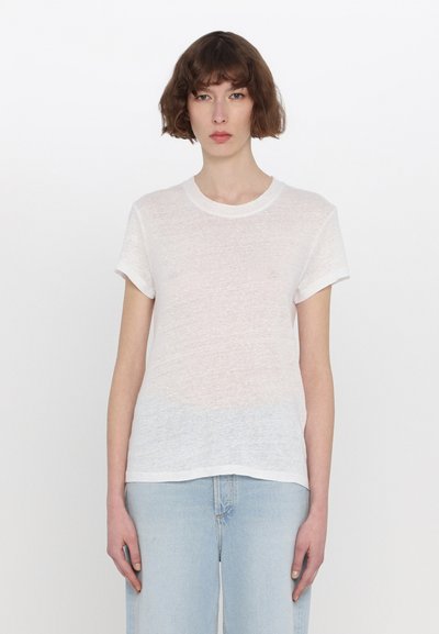 T-shirt blanc à manches courtes en tissu doux et texturé. Avec un col rond et une coupe légèrement ample, présentant un subtil dégradé.