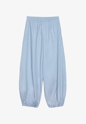 Pantalon ample bleu clair avec taille élastique et poignets élastiques aux chevilles, conçu pour un port décontracté confortable.