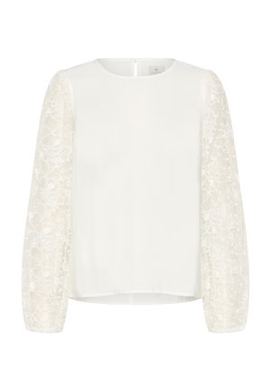 Witte top met een ronde hals en lange doorschijnende mouwen van geborduurde kant. Gladde stof van het lijfje contrasteert met het getextureerde florale mouwontwerp.