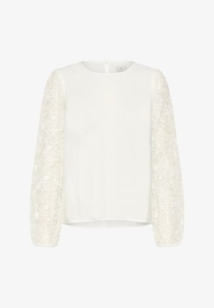 Witte top met een ronde hals en lange doorschijnende mouwen van geborduurde kant. Gladde stof van het lijfje contrasteert met het getextureerde florale mouwontwerp.