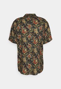Short-sleeved shirt in dark fabric featuring an intricate floral and foliage pattern in red, gold, green, and blue tones. Classic collar design.