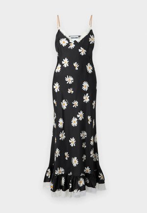 Robe noire à fleurs avec des marguerites blanches, bordure en dentelle et ourlet volanté. Présente de fines bretelles spaghetti et une texture lisse semblable à de la satin.