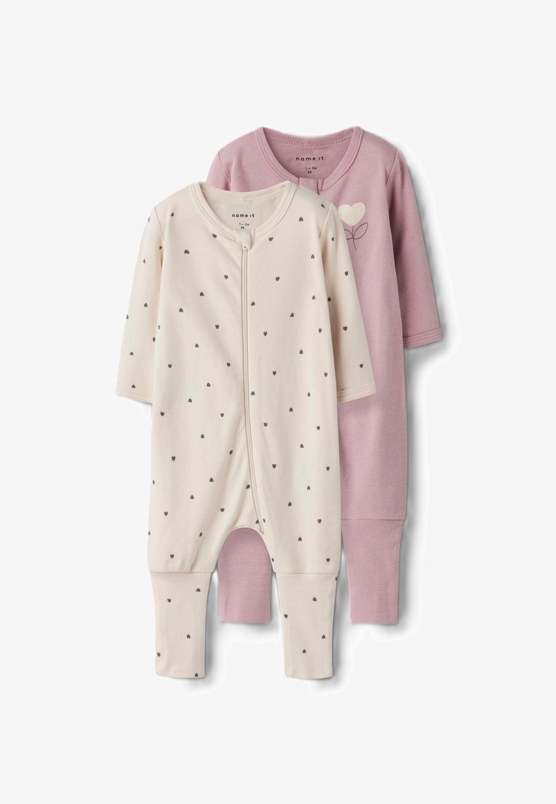 Due body di bodysuit per neonati: uno crema con cuori grigi e una zip frontale, l'altro rosa con un semplice design a cuore e foglia. Materiale in morbido cotone.