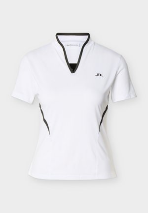 Bela športna majica s kratkimi rokavi s črnim robom v obliki črke V na izrezu, črnimi stranskimi poudarki in majhnim črnim logotipom na levi strani prsi.