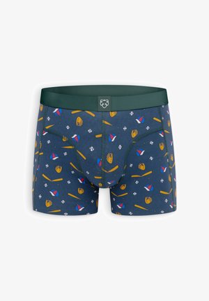 Boxer blu navy con una cintura verde decorata con un divertente motivo di guanti da baseball, palline e mazze nei colori giallo, rosso e bianco.