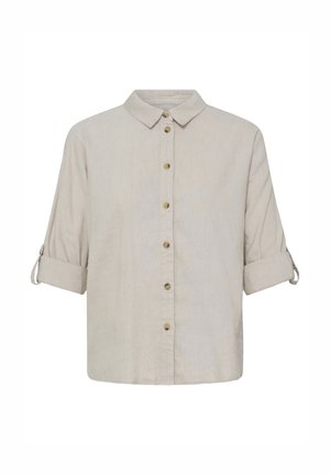 Beežika pikkade varrukatega särk, millel on krae ja ülesrullitud varrukad, mis on kinnitatud nööbitavate aasadega.