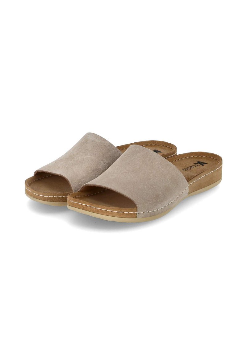 Beige suede sleehak sandalen met open teen, gevoerde inlegzool en een lichtgekleurde rubberen zool. Zichtbare stikseldetails aan de randen.